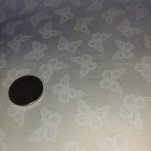 White Butterflies on Cream No# one yard remnant